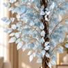 Powder-Blue Foliage in Gold-Rimmed Vase-1 Powder Blue Artificial Foliage Tree in Black Vase